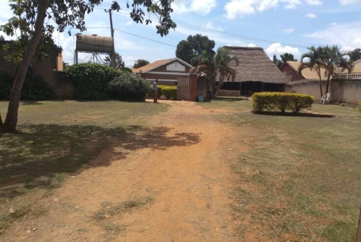 Selling a bar and guest house in bweyogerere seated on one a