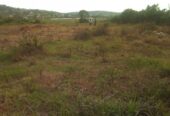 Thats an acre of land at Maya. One kilo meter off tarmac