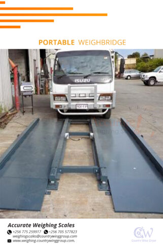 Improved weighbridge with warning signals on overloads