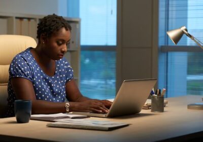 side-view-cuban-woman-replying-emails-work-evening_1098-17552-1