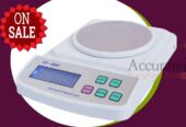 Laboratory precision balance with zero adjustment knob