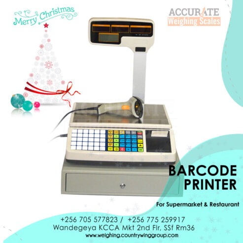 Table top barcode scale with a raised indicator display