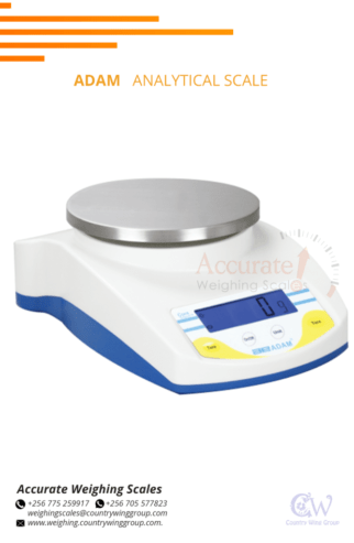 Laboratory precision balance with zero adjustment knob